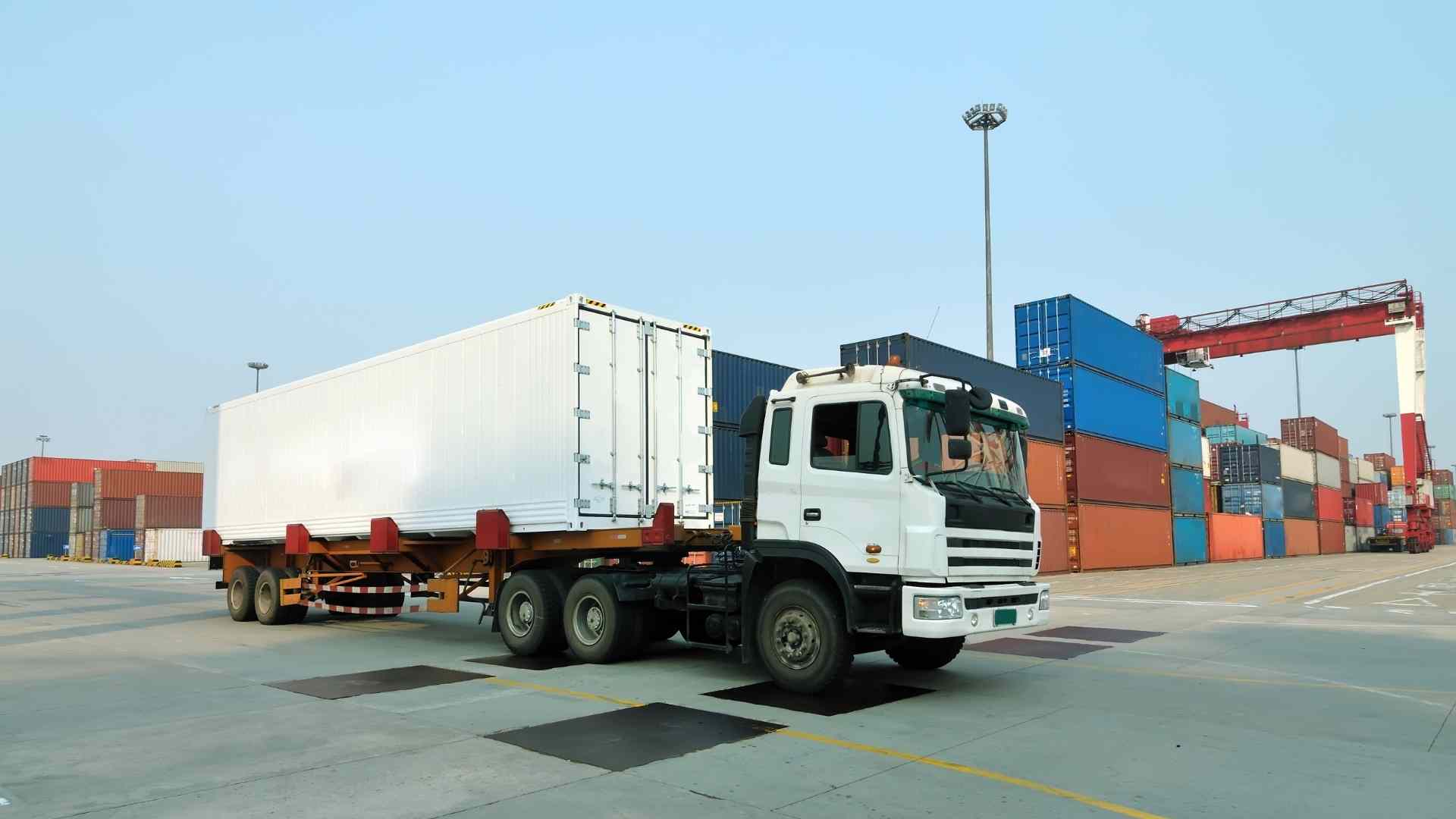 white truck with white container